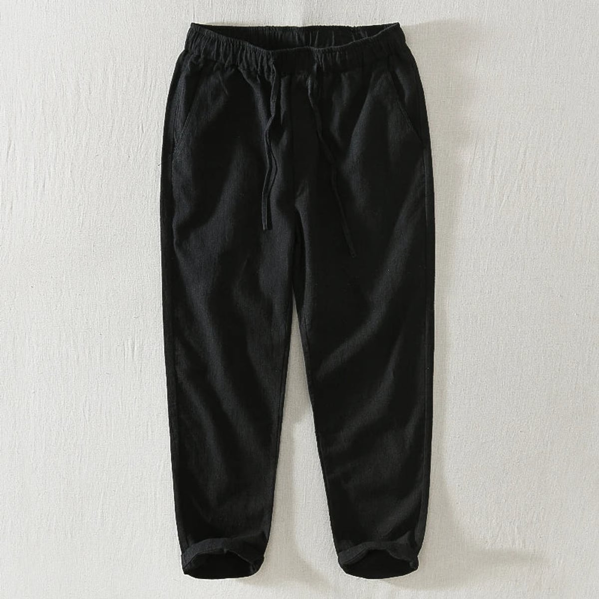 heren relaxed fit broek met toelopende pijp in zwart